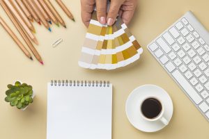 flat-lay-color-palette-house-renovation-with-notebook-colored-pencils
